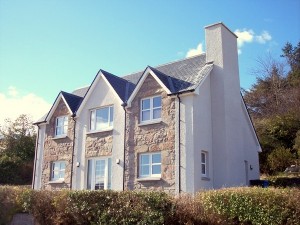 This new build Cottage was constructed just outside the village of Lochcarron in a picturesque location over looking Lochcarron bay.
